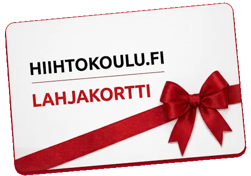 Valkoisen Hiihtokoulu.fi-lahjakortin ympärillä on punainen lahjanauha ja rusetti.